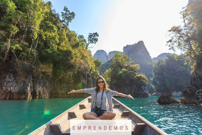 Photo of Woman Sitting on Boat Spreading Her Arms