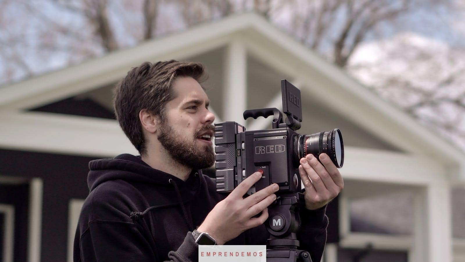 Man in Black Hoodie Jacket Holding Black DSLR Camera