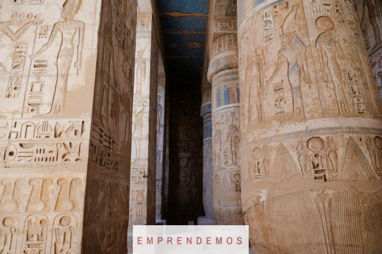 Detailed view of ancient hieroglyphs on temple columns in Luxor, Egypt.