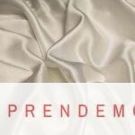white textile on brown wooden table