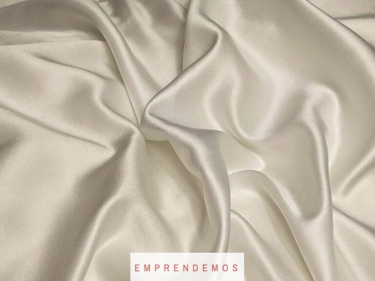 white textile on brown wooden table