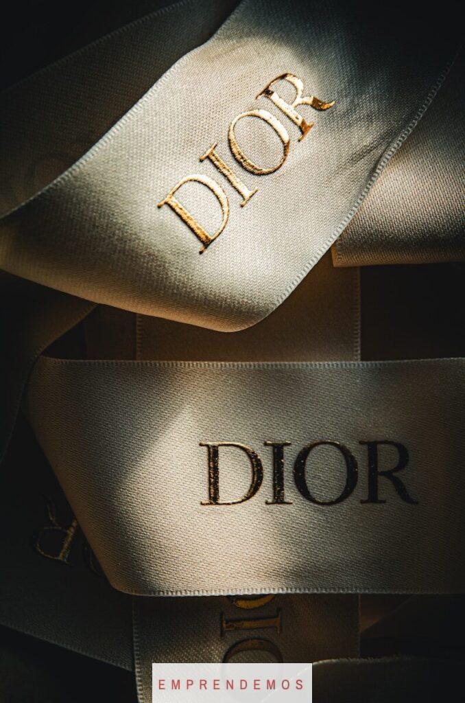 a close up of a pair of shoes with the word dior on it